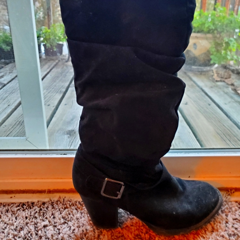 Tall heel, black boots